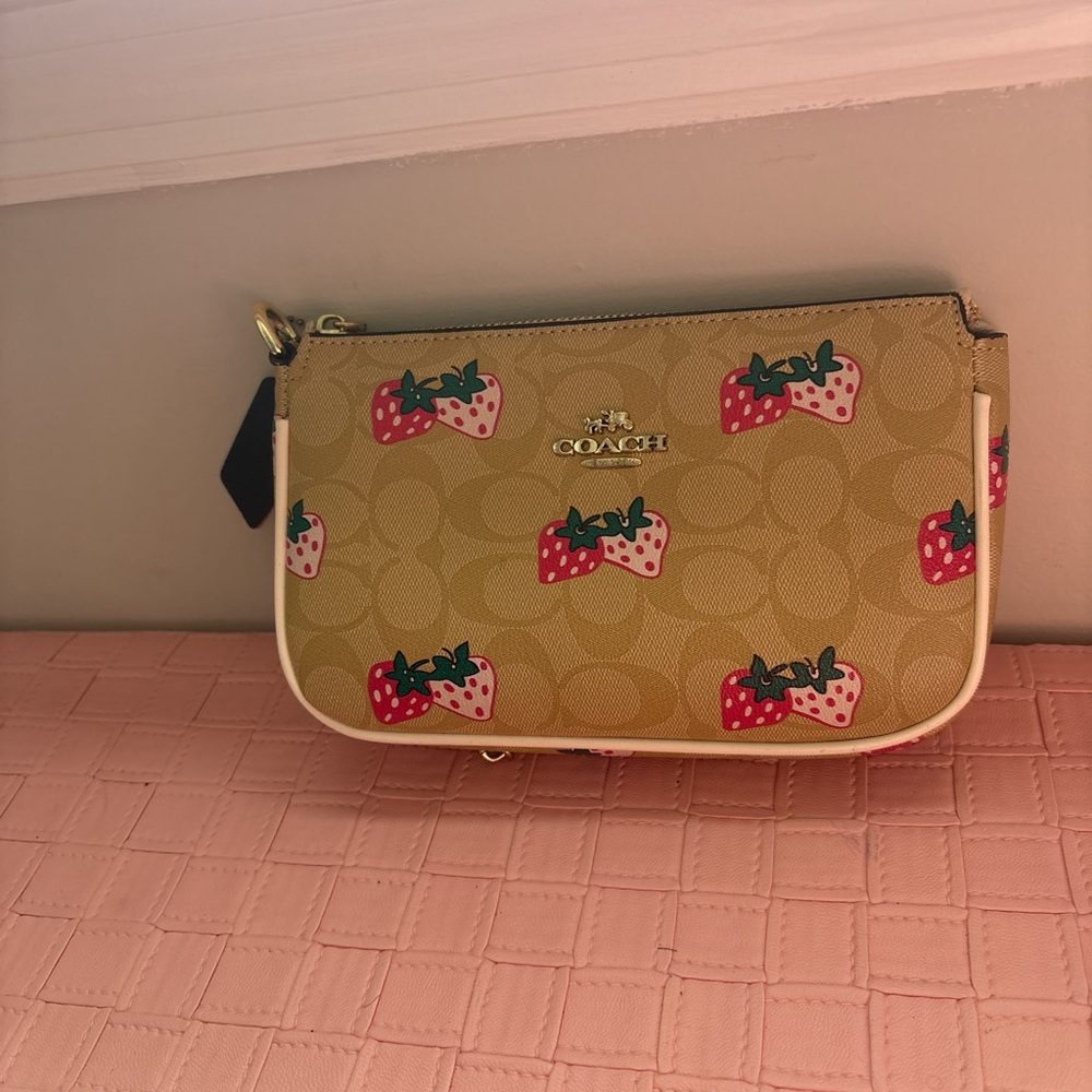 Coach Tan crossbody with Strawberry and signature C Design